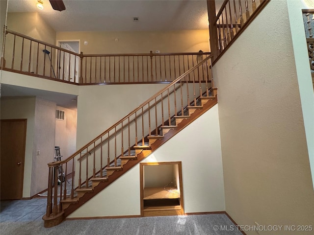 4525 Summit Pl, Sand Springs, OK 74063 - staircase with carpet flooring and a towering ceiling