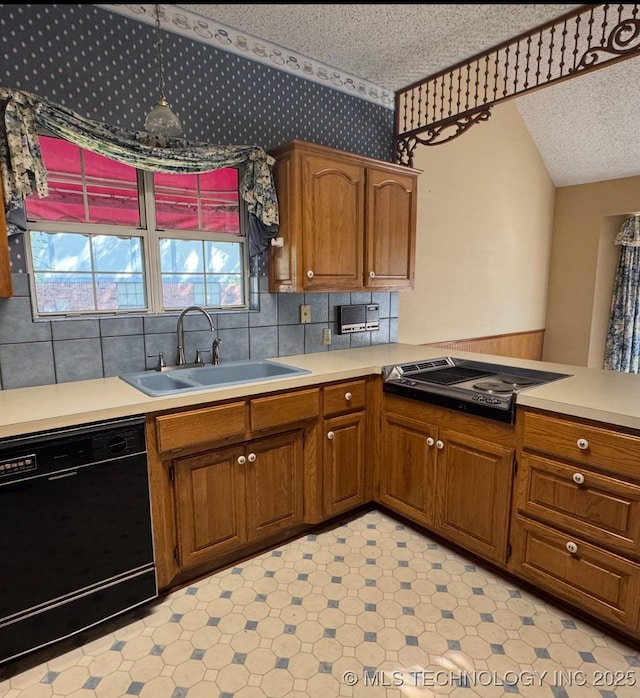 4525 Summit Pl, Sand Springs, OK 74063 - kitchen featuring black dishwasher, stovetop with downdraft, brown cabinets, a textured ceiling, and light countertops