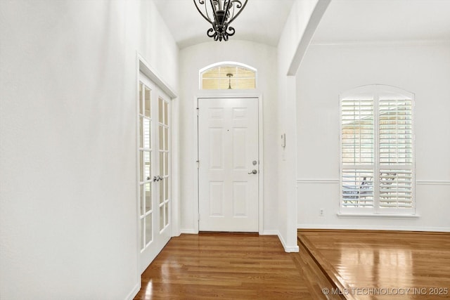 1005 E Fargo St, Broken Arrow, OK 74012 - entrance foyer featuring wood finished floors and arched walkways