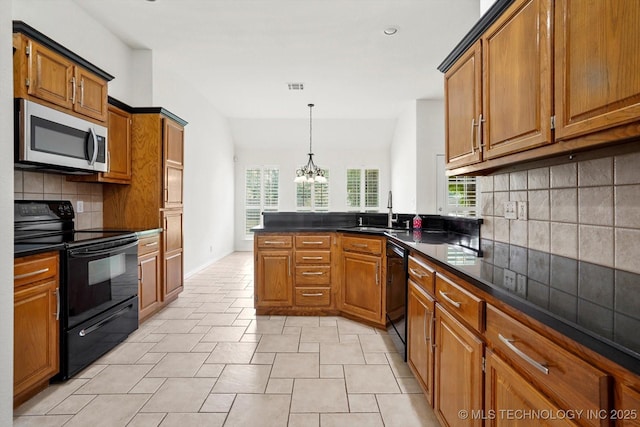 1005 E Fargo St, Broken Arrow, OK 74012 - kitchen featuring black appliances, brown cabinetry, dark countertops, a chandelier, and a peninsula