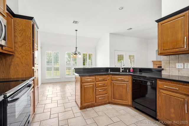 1005 E Fargo St, Broken Arrow, OK 74012 - kitchen with black dishwasher, range with electric cooktop, brown cabinets, and recessed lighting