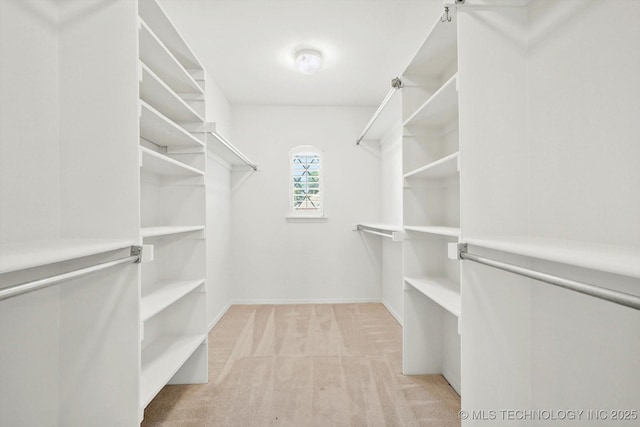 1005 E Fargo St, Broken Arrow, OK 74012 - walk in closet featuring light carpet