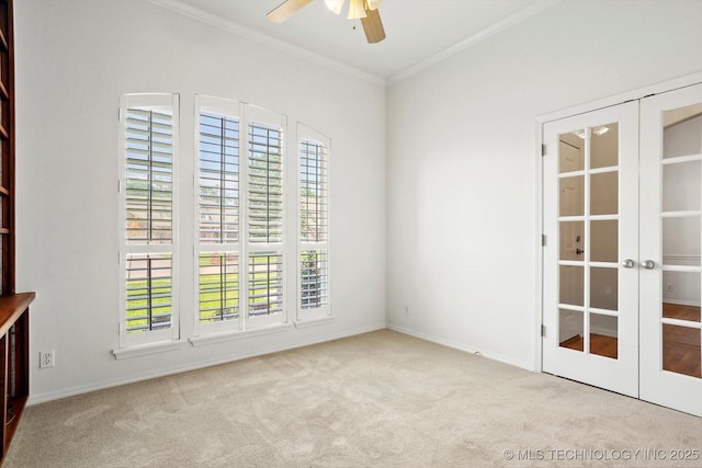 1005 E Fargo St, Broken Arrow, OK 74012 - carpeted empty room featuring a ceiling fan, french doors, ornamental molding, and healthy amount of natural light