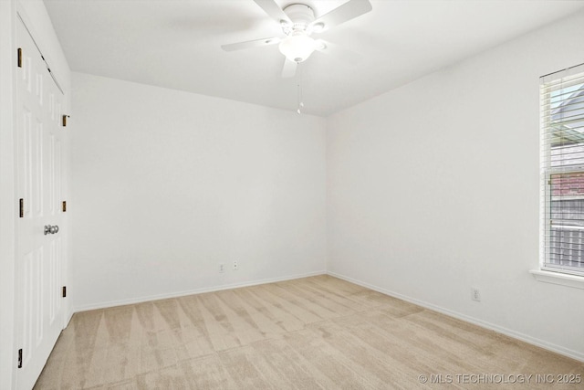 1005 E Fargo St, Broken Arrow, OK 74012 - empty room with light colored carpet and a ceiling fan