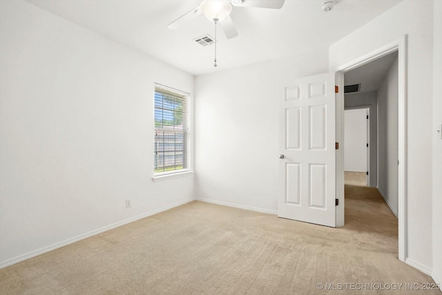 1005 E Fargo St, Broken Arrow, OK 74012 - unfurnished bedroom featuring light carpet and a ceiling fan