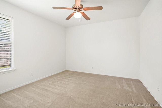 1005 E Fargo St, Broken Arrow, OK 74012 - carpeted empty room with ceiling fan and baseboards