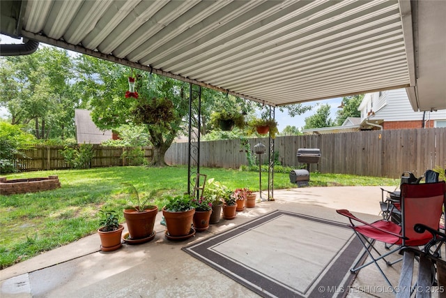 6016 E 52nd Pl, Tulsa, OK 74135 - fenced backyard featuring a patio
