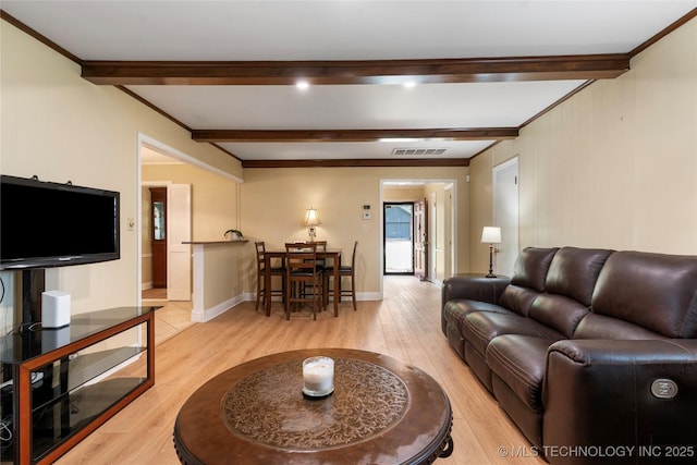 6016 E 52nd Pl, Tulsa, OK 74135 - living room featuring light wood-style floors and beam ceiling