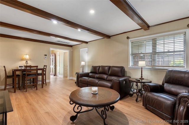 6016 E 52nd Pl, Tulsa, OK 74135 - living room with light wood finished floors, beamed ceiling, and ornamental molding