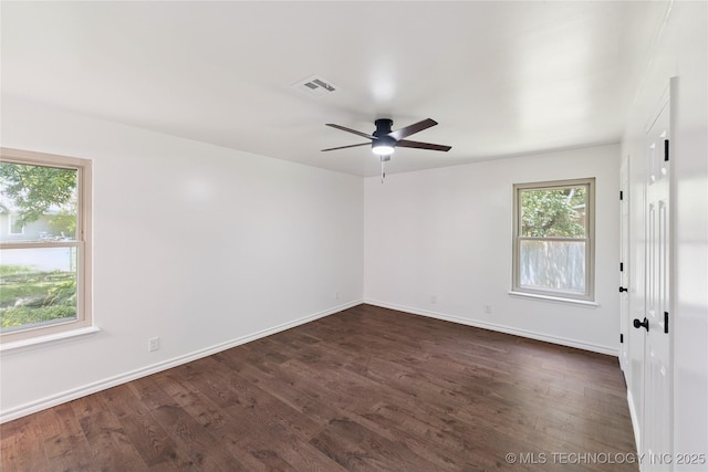 1800 N 26th St, Broken Arrow, OK 74014 - spare room with dark wood finished floors and ceiling fan