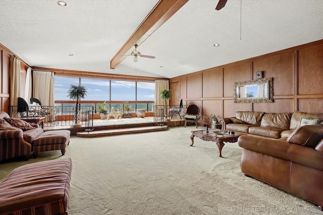 17331 S 174th Ave E, Bixby, OK 74008 - living area featuring ceiling fan, carpet flooring, a textured ceiling, and a decorative wall