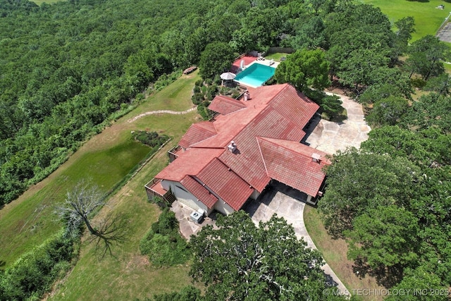 17331 S 174th Ave E, Bixby, OK 74008 - aerial view of property and surrounding area featuring a forest and a pool area