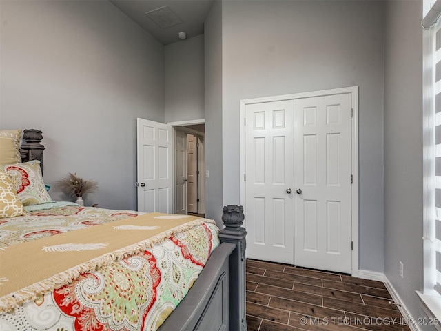 353800 E 5400th Rd, Maramec Twp, OK 74045 - bedroom featuring wood finish floors, a closet, and a high ceiling