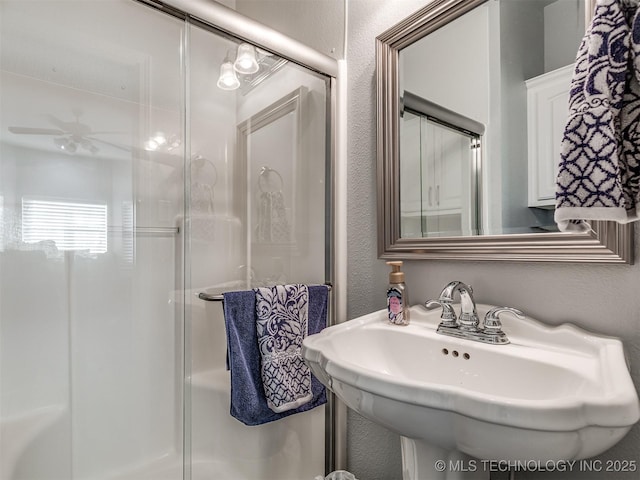 353800 E 5400th Rd, Maramec Twp, OK 74045 - full bathroom featuring a textured wall, a stall shower, and ceiling fan
