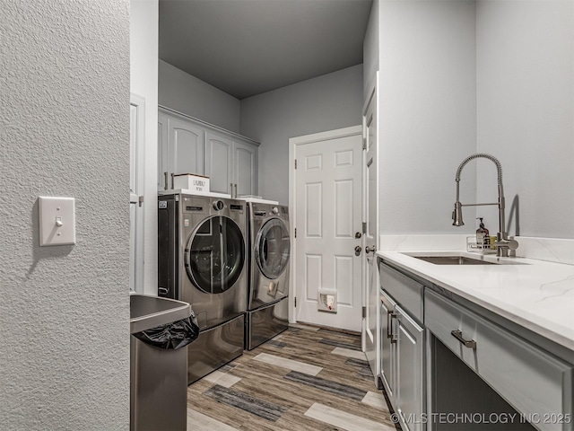 353800 E 5400th Rd, Maramec Twp, OK 74045 - laundry room featuring cabinet space, washing machine and clothes dryer, and dark wood-type flooring