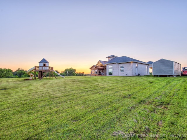 353800 E 5400th Rd, Maramec Twp, OK 74045 - yard at dusk featuring a yard, stairway, and a wooden deck