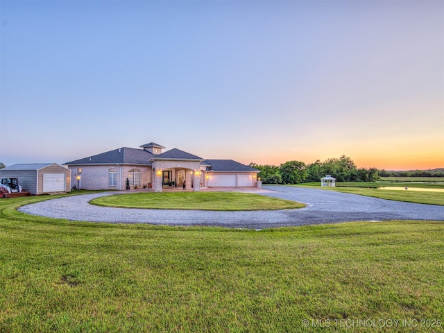 353800 E 5400th Rd, Maramec Twp, OK 74045 - view of front facade featuring a front yard, brick siding, and a garage