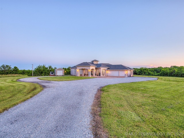 353800 E 5400th Rd, Maramec Twp, OK 74045 - view of front of home featuring asphalt driveway, a garage, and a front yard