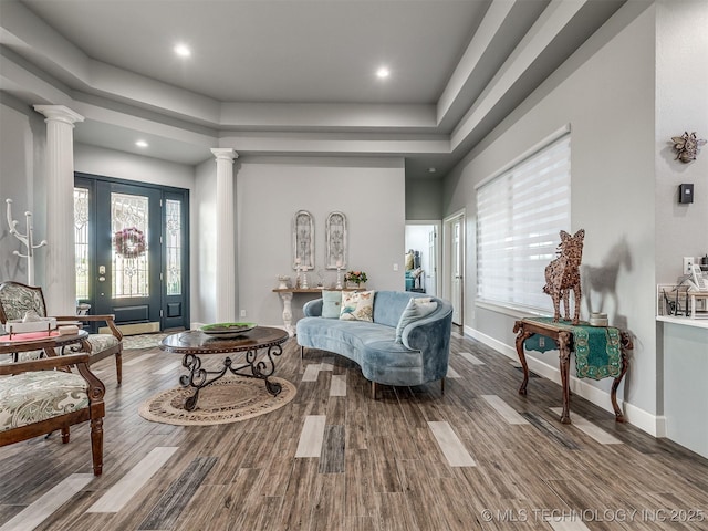 353800 E 5400th Rd, Maramec Twp, OK 74045 - living room with decorative columns, wood finished floors, a tray ceiling, and recessed lighting