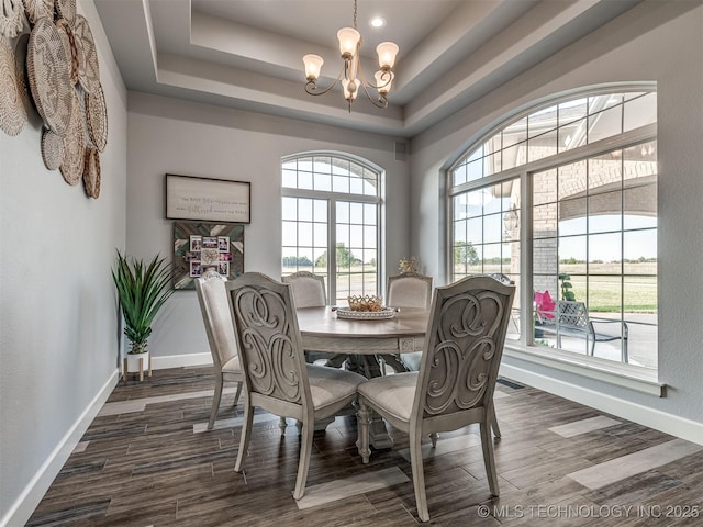 353800 E 5400th Rd, Maramec Twp, OK 74045 - dining space featuring a chandelier, dark wood-style flooring, recessed lighting, and a tray ceiling