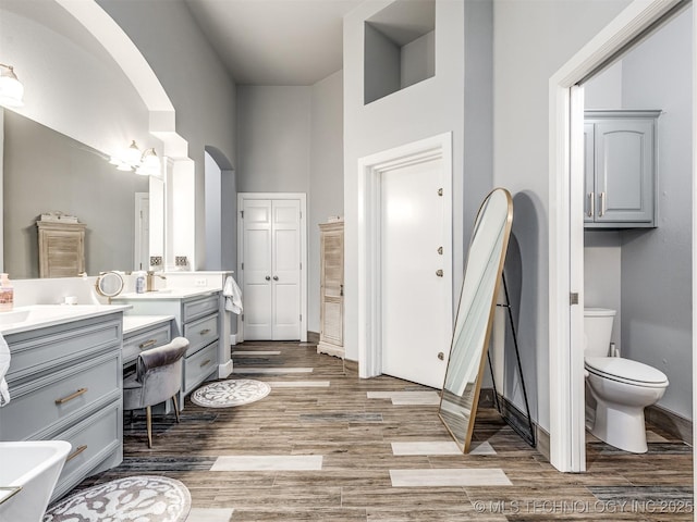353800 E 5400th Rd, Maramec Twp, OK 74045 - full bathroom with vanity, wood finished floors, and a towering ceiling