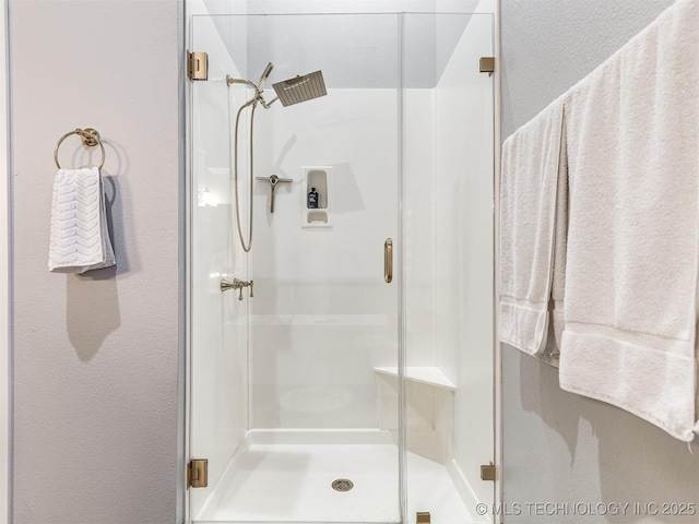 353800 E 5400th Rd, Maramec Twp, OK 74045 - bathroom with a shower stall and a textured wall