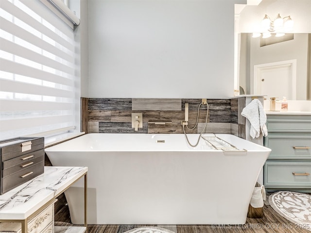 353800 E 5400th Rd, Maramec Twp, OK 74045 - full bath with a freestanding tub and wood finished floors