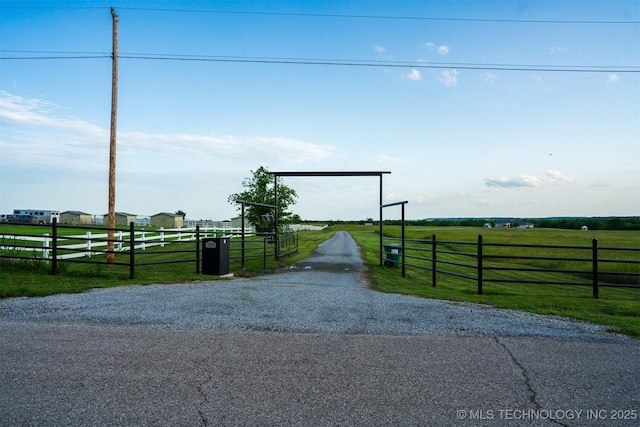 353800 E 5400th Rd, Maramec Twp, OK 74045 - view of dirt / gravel driveway with a rural view and a gated entry