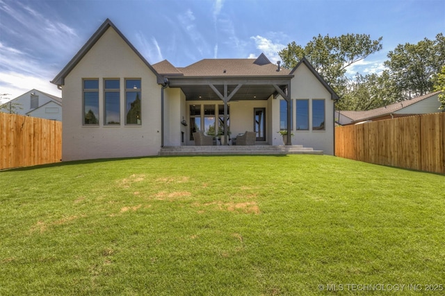 3528 S Troost Ave, Tulsa, OK 74105 - rear view of house featuring a fenced backyard and a shingled roof
