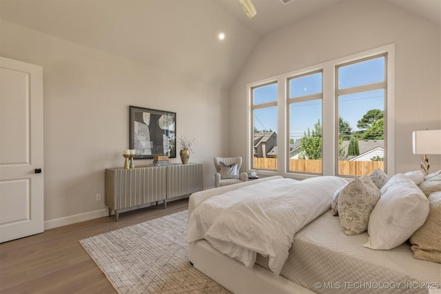 3528 S Troost Ave, Tulsa, OK 74105 - bedroom featuring wood finished floors, high vaulted ceiling, and recessed lighting