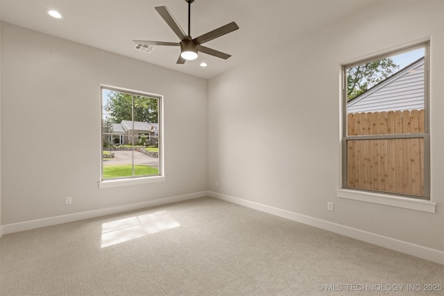 3528 S Troost Ave, Tulsa, OK 74105 - empty room with a ceiling fan, carpet floors, and recessed lighting