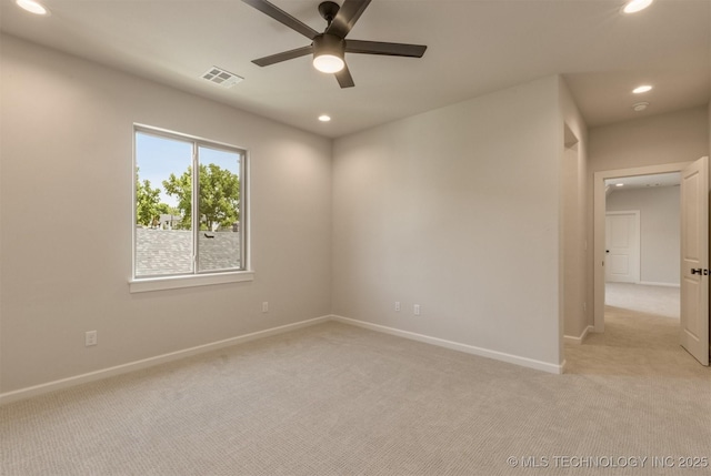 3528 S Troost Ave, Tulsa, OK 74105 - empty room with light colored carpet, a ceiling fan, and recessed lighting