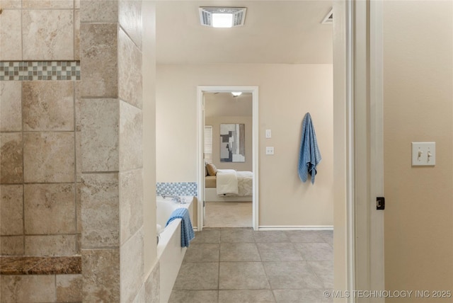 11936 S 98th E Ave, Bixby, OK 74008 - ensuite bathroom featuring a garden tub and tile patterned floors