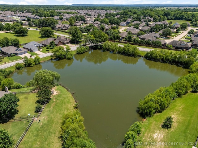 11936 S 98th E Ave, Bixby, OK 74008 - aerial perspective of suburban area featuring a nearby body of water