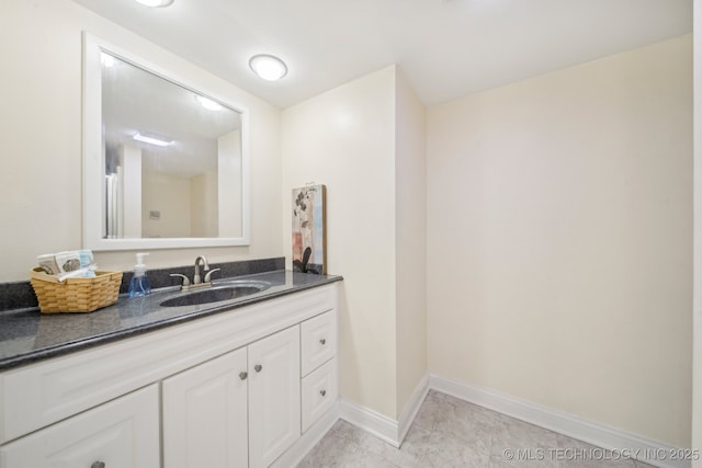 450 W 7th St # 908, Tulsa, OK 74119 - bathroom with vanity and baseboards