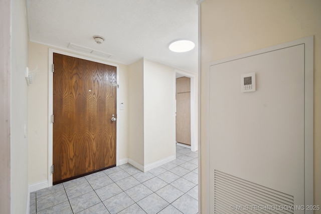 450 W 7th St # 908, Tulsa, OK 74119 - entrance foyer with light tile patterned floors and baseboards