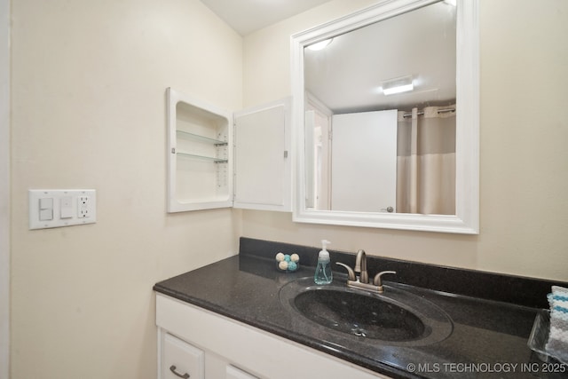 450 W 7th St # 908, Tulsa, OK 74119 - bathroom featuring vanity