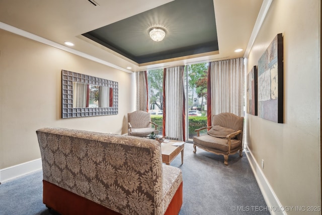450 W 7th St # 908, Tulsa, OK 74119 - living area featuring carpet, a tray ceiling, recessed lighting, and ornamental molding