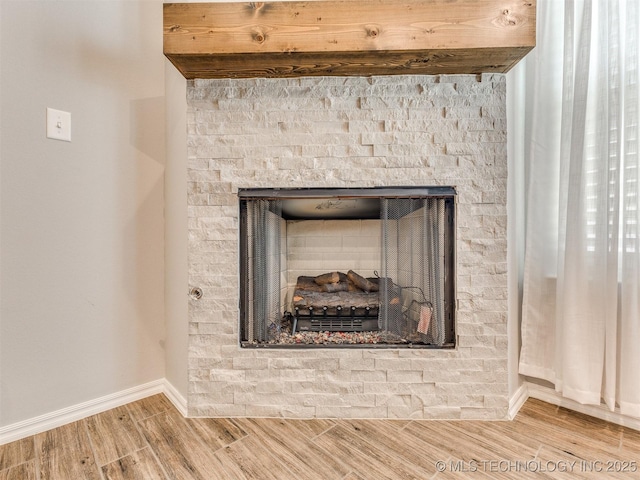 7809 S Redbud Ave, Broken Arrow, OK 74011 - detailed view of a fireplace and wood finished floors