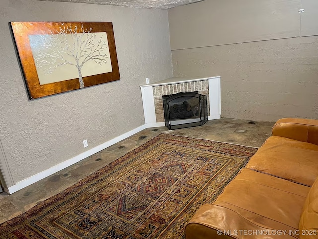 3156 S Madison Ave, Tulsa, OK 74105 - living room featuring a textured wall and a fireplace