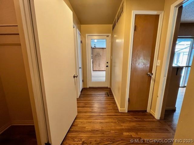 3707 Canton Ave, Tulsa, OK 74135 - hall featuring wood finished floors and baseboards