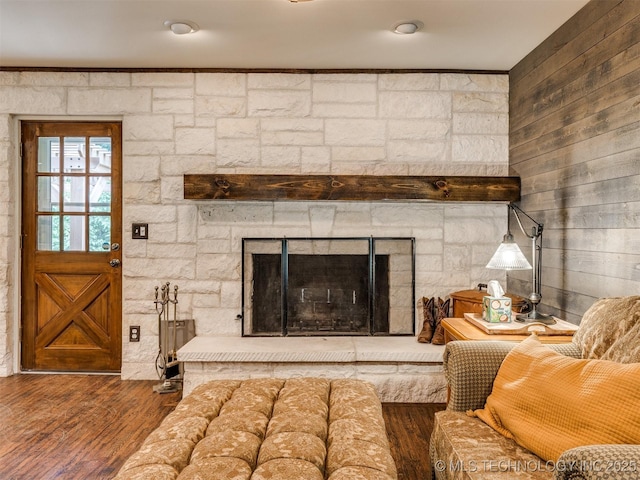 7001 S Redbud Ave, Broken Arrow, OK 74011 - living room featuring a stone fireplace and wood finished floors