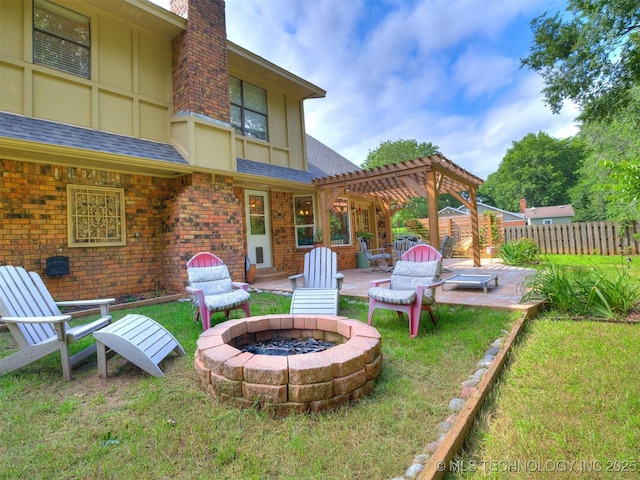 7001 S Redbud Ave, Broken Arrow, OK 74011 - view of yard with a fire pit, a pergola, and a patio area
