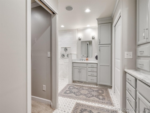 7001 S Redbud Ave, Broken Arrow, OK 74011 - bathroom featuring walk in shower, vanity, and recessed lighting