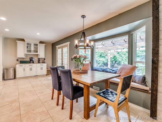 7001 S Redbud Ave, Broken Arrow, OK 74011 - dining area featuring recessed lighting, a chandelier, light tile patterned floors, and french doors