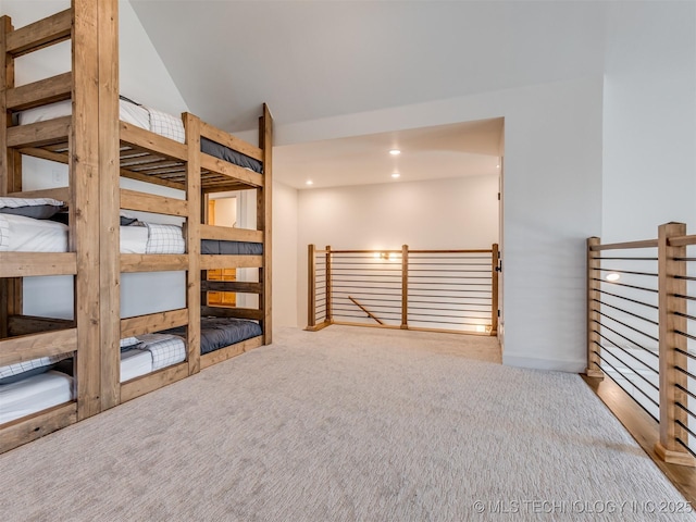 409340 E 1190th Rd, Eufaula, OK 74432 - unfurnished bedroom featuring carpet floors, recessed lighting, and lofted ceiling