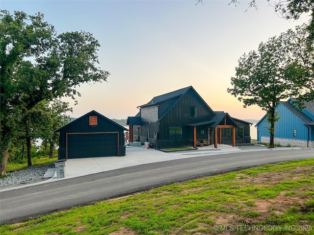 409340 E 1190th Rd, Eufaula, OK 74432 - view of front of property featuring board and batten siding and a detached garage