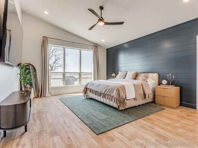 409340 E 1190th Rd, Eufaula, OK 74432 - bedroom featuring light wood-style flooring, lofted ceiling, recessed lighting, ceiling fan, and wooden walls
