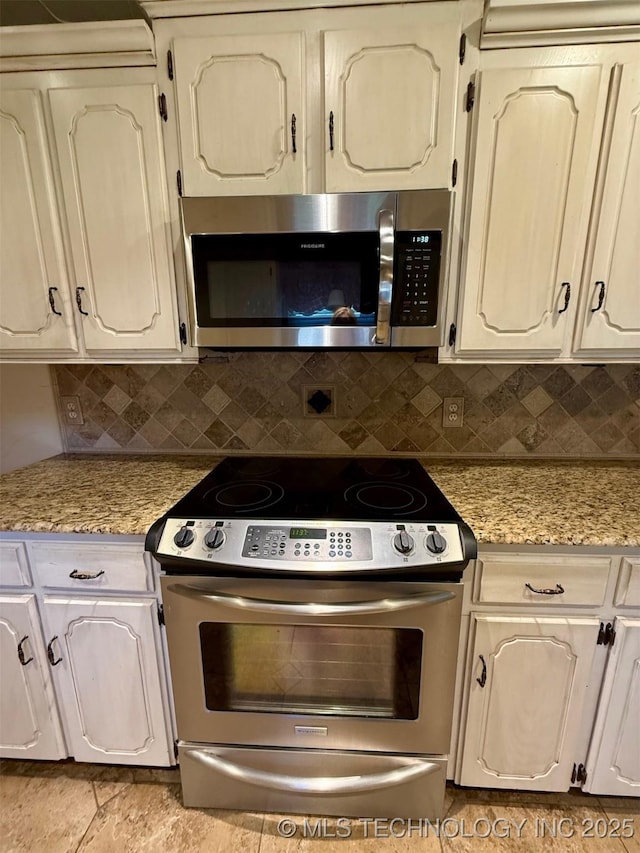 9613 N 107th E Ave, Owasso, OK 74055 - kitchen featuring stainless steel appliances and backsplash