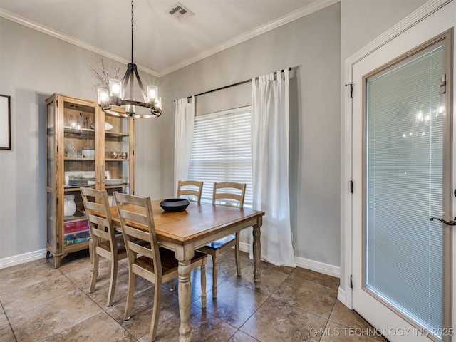 2603 S 16th Pl, Broken Arrow, OK 74012 - dining space featuring a chandelier and ornamental molding